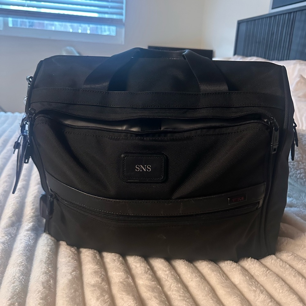 Tumi Black Travel Bag Durable and Professional